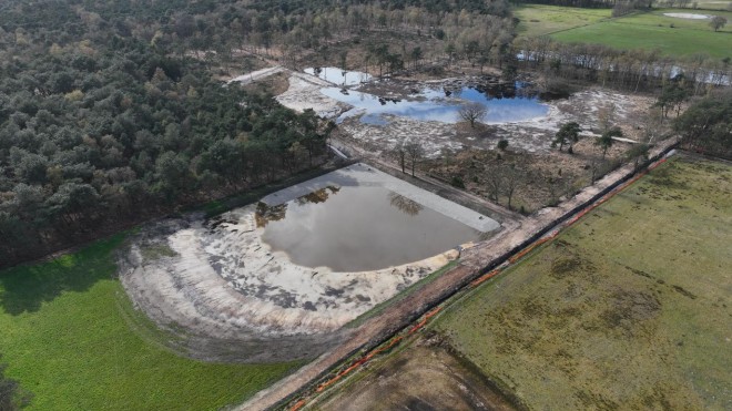 Bovenaanzicht afgewerkte fosfaatfilter met op achtergrond het herstelde Evertandven